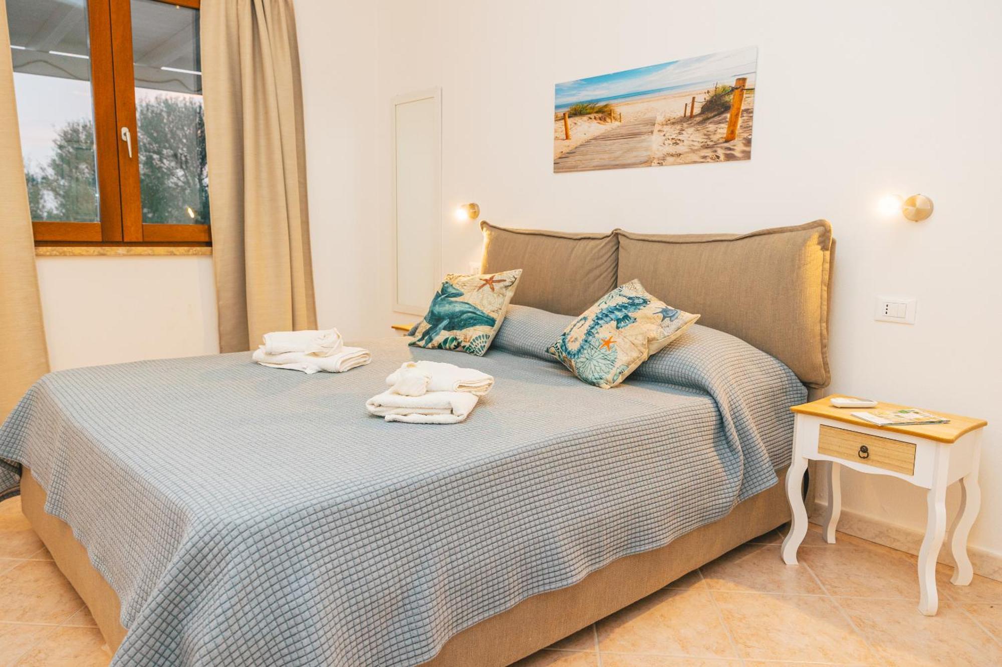 Case Vacanze Il Sogno 2 Porto Pino Phòng bức ảnh