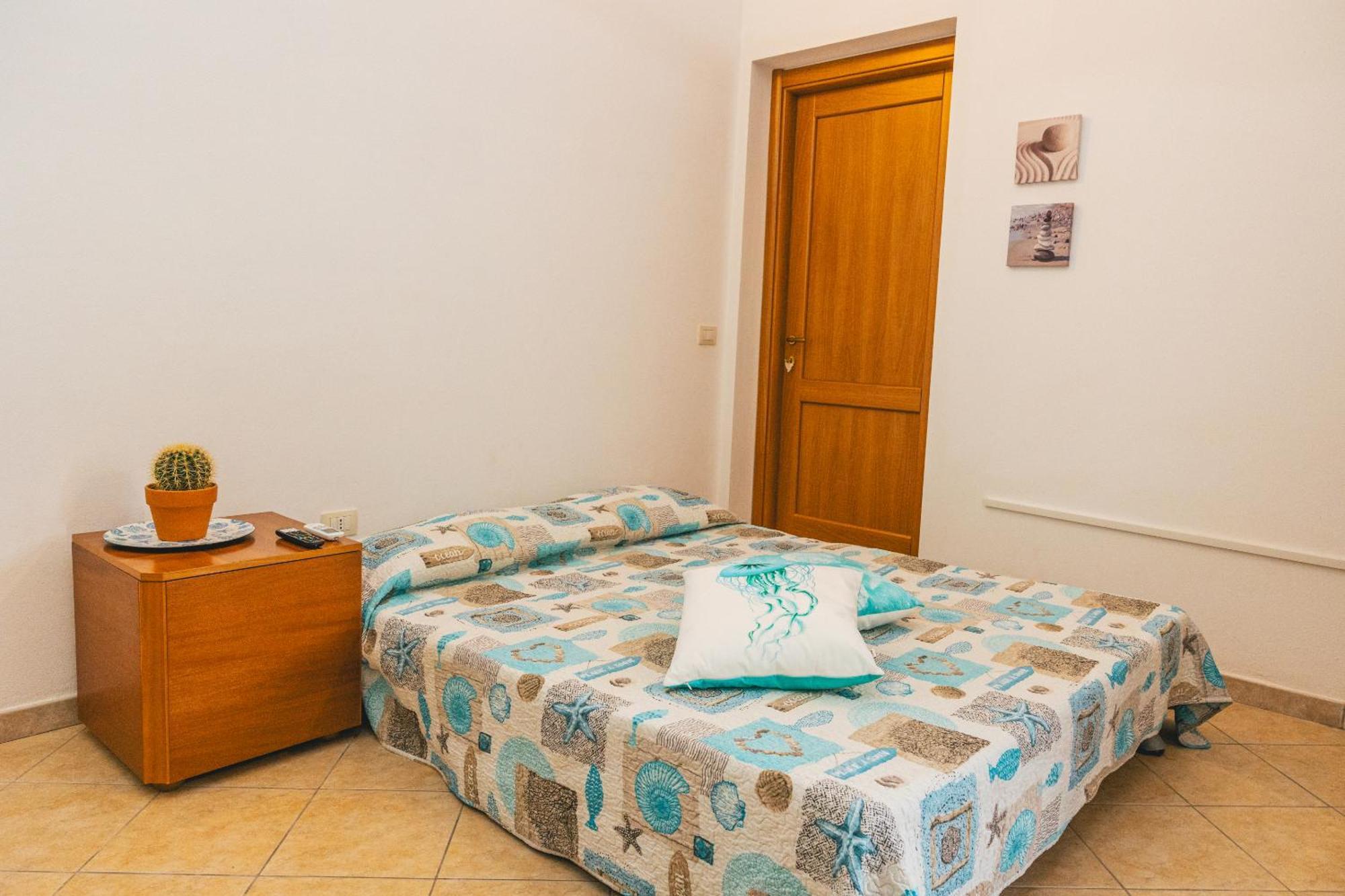 Case Vacanze Il Sogno 2 Porto Pino Phòng bức ảnh