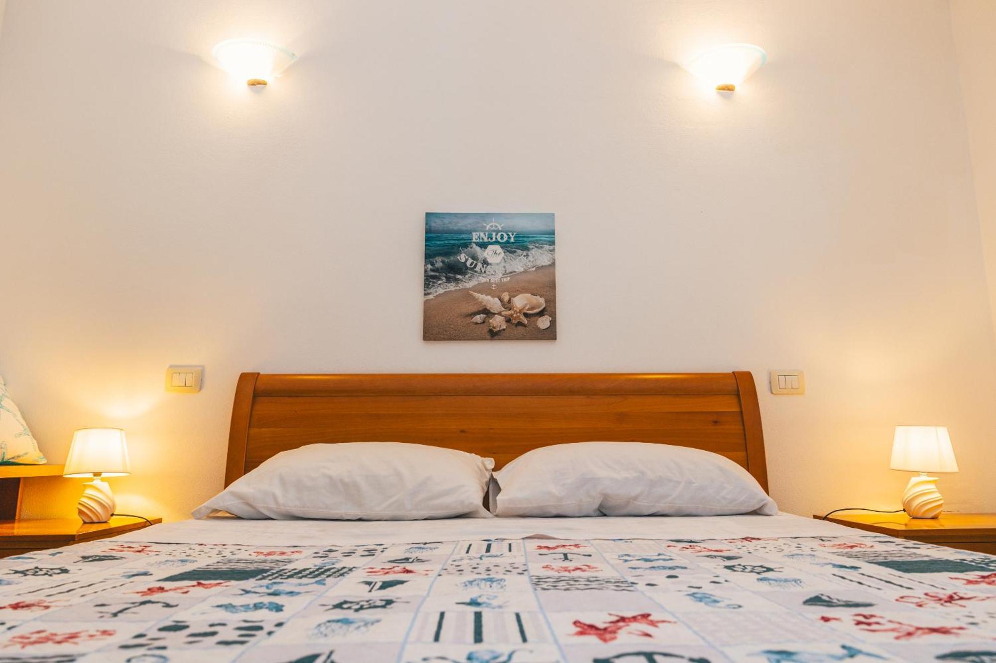 Case Vacanze Il Sogno 2 Porto Pino Phòng bức ảnh
